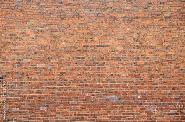 Fototapeta Large red brick wall full frame