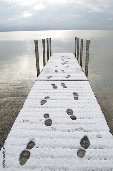 Obraz Snow Covered Dock With Human Footprints