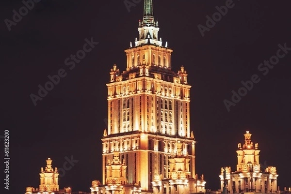 Obraz Moscow, Russia - 8 June 2023: Night panoramic photo of Moscow, hotel "Ukraine" close-up.