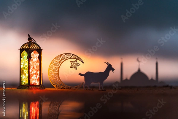 Fototapeta Eid Mubarak background, Traditional Ramadan lantern lamp with crescent moon and goat, New  Eid Al Adha image