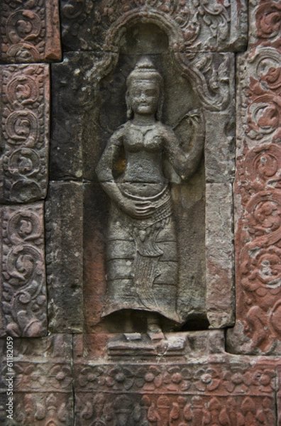 Fototapeta Apsara carved on the stone columns of Angkor Wat
