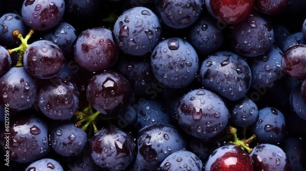 Fototapeta Many fresh purple grape background adorned with some droplets of water for food magazine photography generative ai