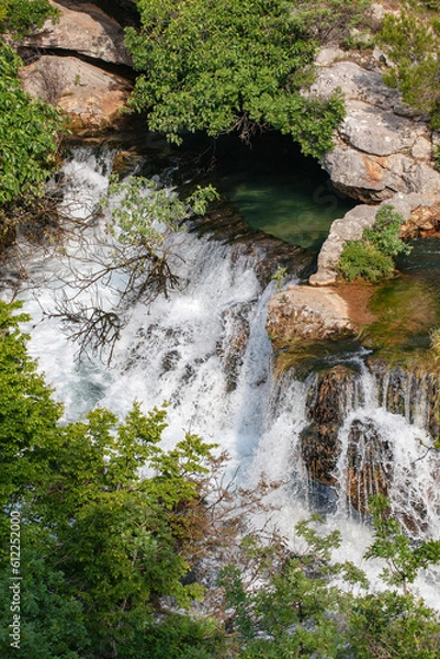 Obraz a river that springs from a cave