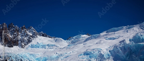 Fototapeta Snow Mountains Sunlight Build Wallpaper. Generative AI