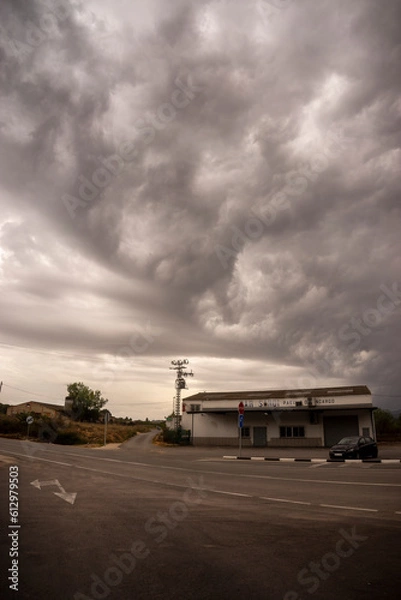 Obraz Cloudy landscape in a rural area