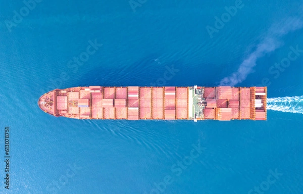 Fototapeta Top view Logistics and transportation of Container Cargo ship and Cargo plane with working crane bridge in shipyard at sunrise, logistic import export and transport industry background