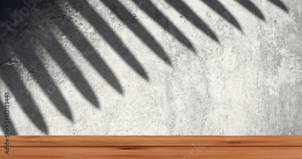 Fototapeta Realistic mockup wooden tabletop with cement wall in background,tree shadow scene, Generative AI illustration