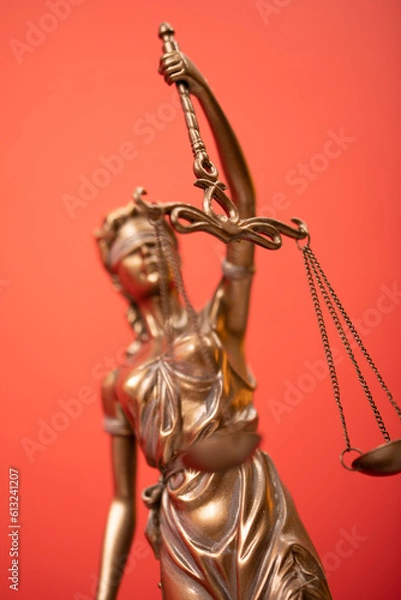Fototapeta Bronze statue of the Goddess of Justice Themis, holding the Law Scales in her hands,