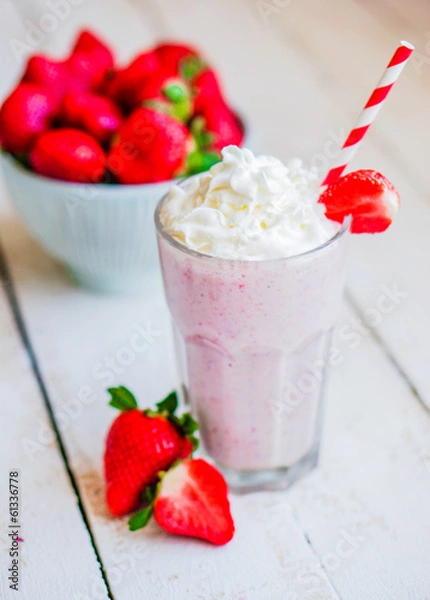 Obraz Strawberry milkshake on wooden background