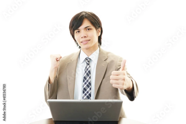 Fototapeta ガッツポーズのビジネスマン