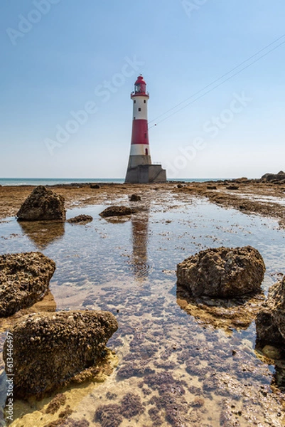 Obraz A view of Beachy Head Lighthouse off the Sussex coast, at low tide on a summer's day