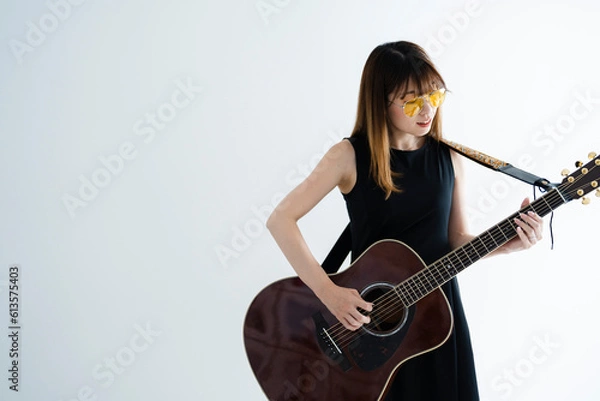 Obraz 女性ギタリスト