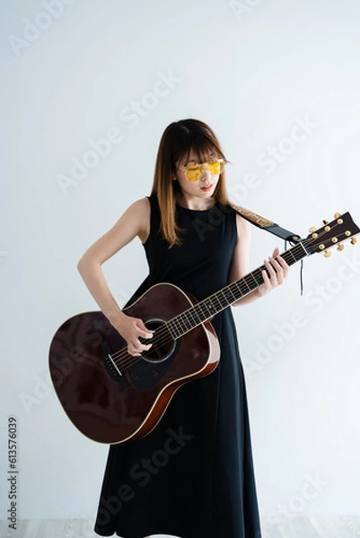 Obraz 女性ギタリスト
