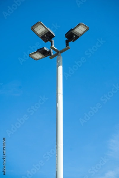 Fototapeta street led lamp post or lantern on a blue sky background.