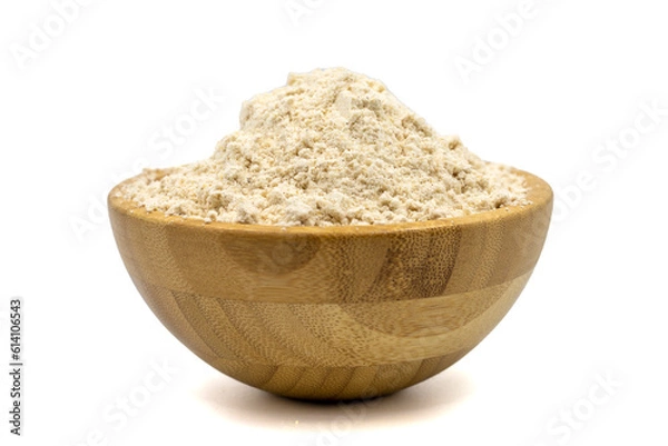 Fototapeta Mahlep powder isolated on white background. Mahlep powder in wooden bowl