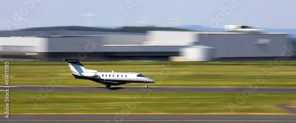 Fototapeta a plain private jet takes off speed panorama