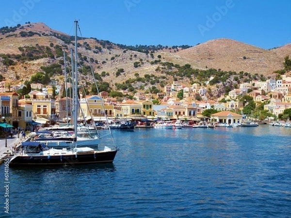 Fototapeta Old harbor with boats at Symi, Greece