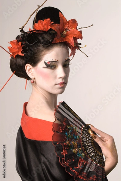 Obraz The young Japanese woman on a grey background