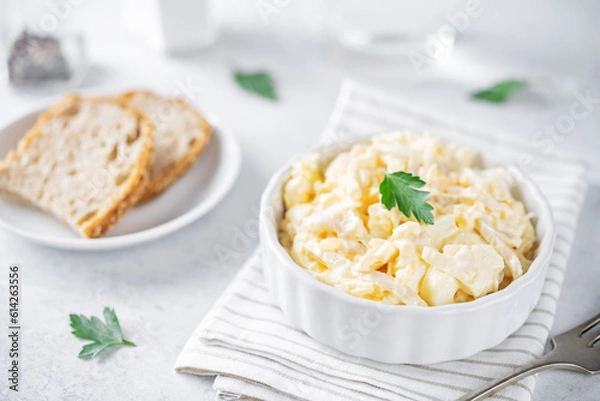Fototapeta Squid egg mayonnaise salad in a bowl