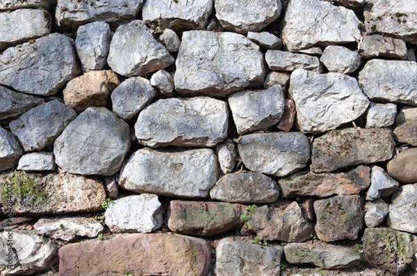 Obraz Rough grey stone wall texture