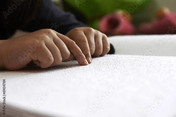 Fototapeta blind children read text in braille