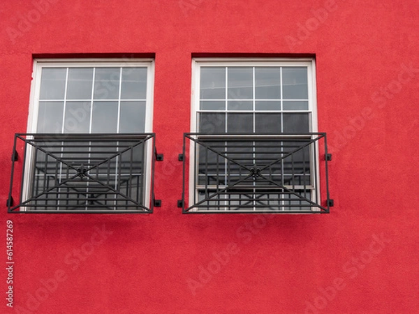 Fototapeta Windows and Red Stucco Wall