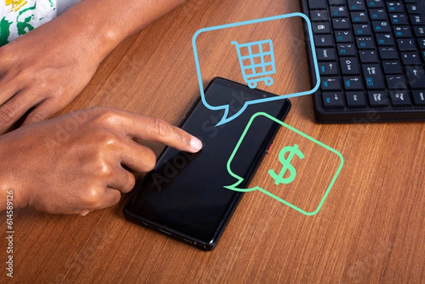 Fototapeta touching the cellphone screen, a virtual hologram of the shopping icon appears