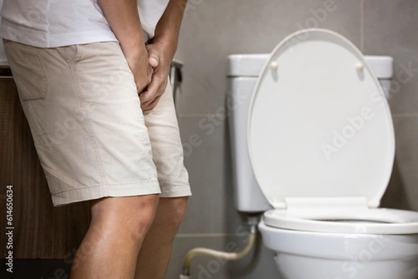 Obraz Sick middle aged man with cystitis from frequent urinary retention or infectious disease from urinary retention,male patient suffering from dysuria,acute cystitis,urinary bladder system abnormalities