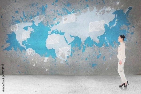 Fototapeta Composite image of unsmiling asian businesswoman walking