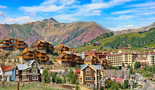 Obraz Vacation condominiums line the hillsides in the Colorado resort town of Crested Butte