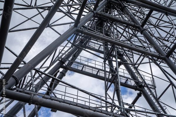 Fototapeta Part of a metal structure made of welded metal beams and pipes