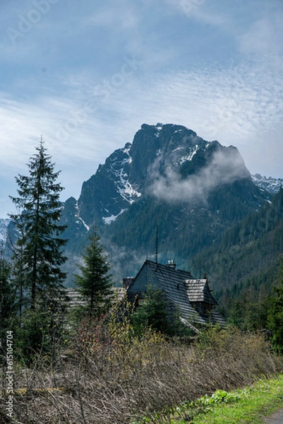 Obraz mountain view with a old mountain house in front; high hill and beautiful sky in polish tatry area Zakopane