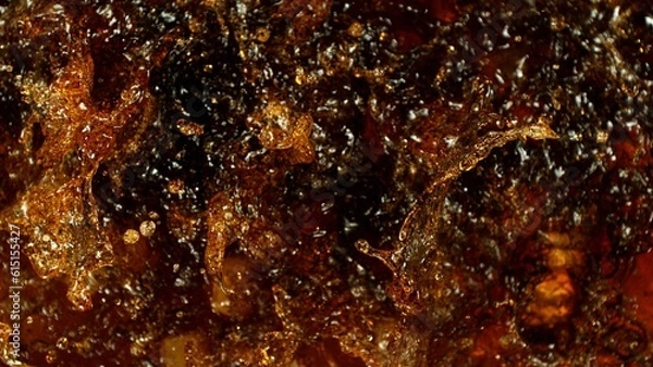 Fototapeta Cola with ice cubes splashing