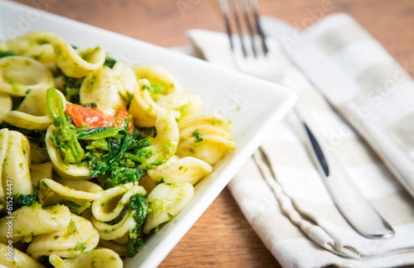 Fototapeta Orecchiette pasta with broccoli rabe and red pepper