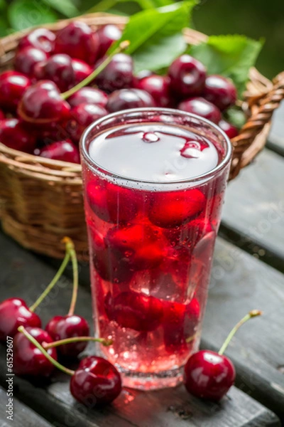 Fototapeta Close-up of sweet cherries juice