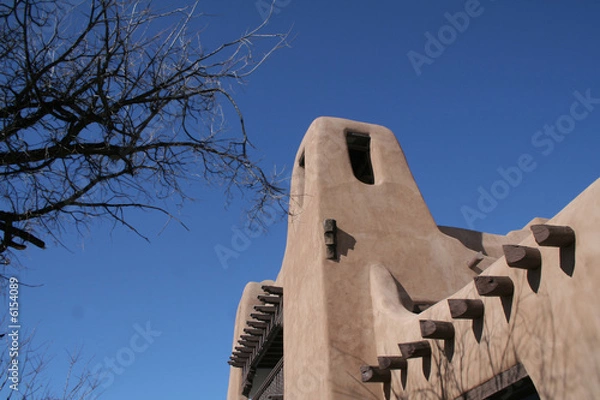 Fototapeta Adobe style building with wood beams