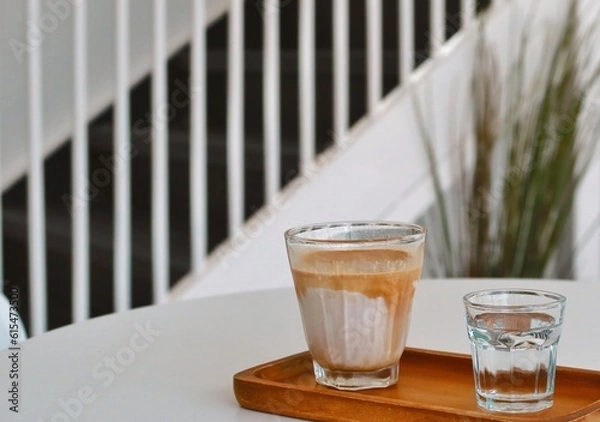 Obraz Iced dirty coffee with white background
