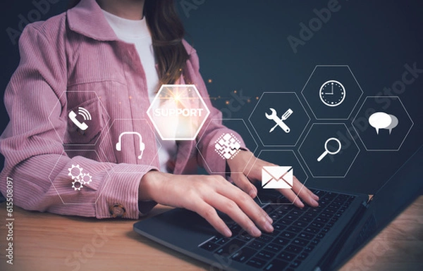 Fototapeta Hand using computer with VR screen support customer icon. Technical support customer service Technology internet, it support, call center, customer service help, Business Technology Internet Concept