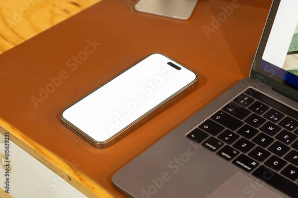 Obraz mobile phone with password page on working desk and leather sofa