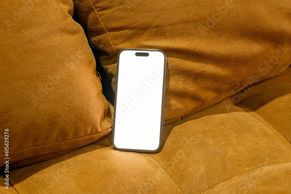 Obraz mobile phone with password page on working desk and leather sofa