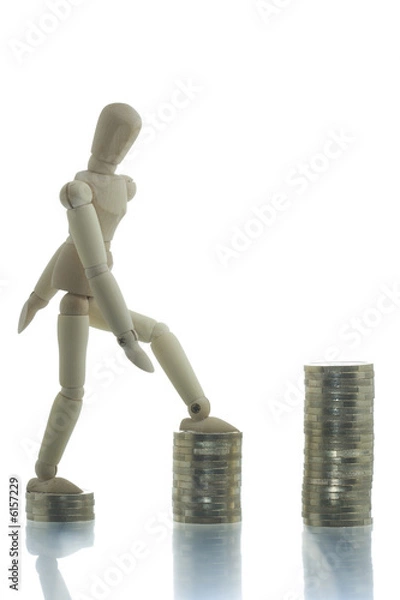 Obraz Manikin going up three coin piles