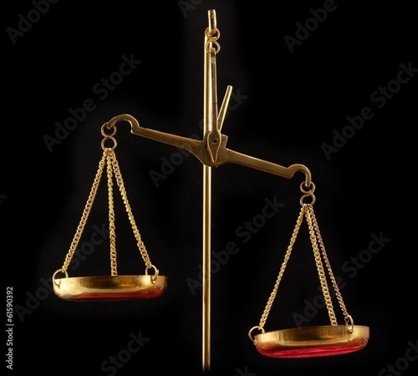 Obraz pair of gold scales on black