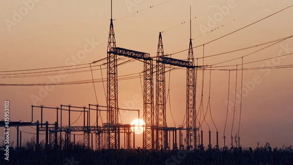 Fototapeta High voltage power lines at sunrise