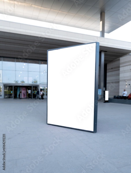 Obraz Empty vertical street billboard stand with mall background.
