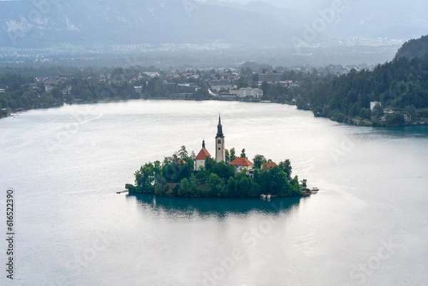Fototapeta Mystical Charms: Bled Island Embraced by Stormy Splendor on Bled Lake