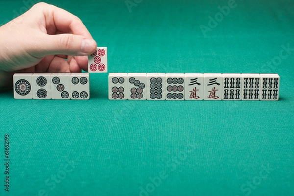 Obraz Smooth table surface with a mahjong on it