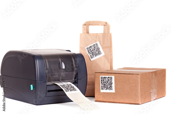 Obraz .barcode printer and packaging boxes marked with a bar code