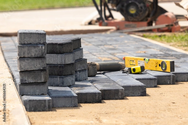 Fototapeta execution of the paving stone surface and leveling
wykonanie nawierzchni z kostki brukowej oraz wyrównanie