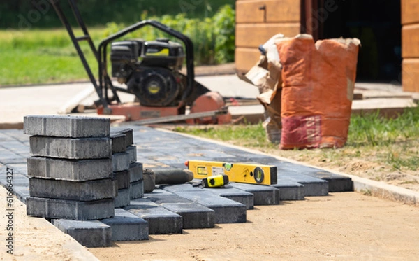 Fototapeta execution of the paving stone surface and leveling
wykonanie nawierzchni z kostki brukowej oraz wyrównanie