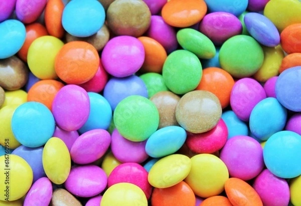 Obraz Multi colored candy coated chocolate button sprinkle texture - marties, sprinkles